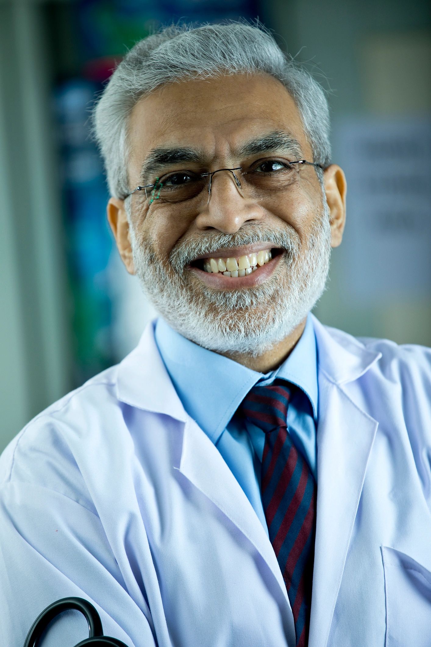 senior Indian male doctor portrait professional