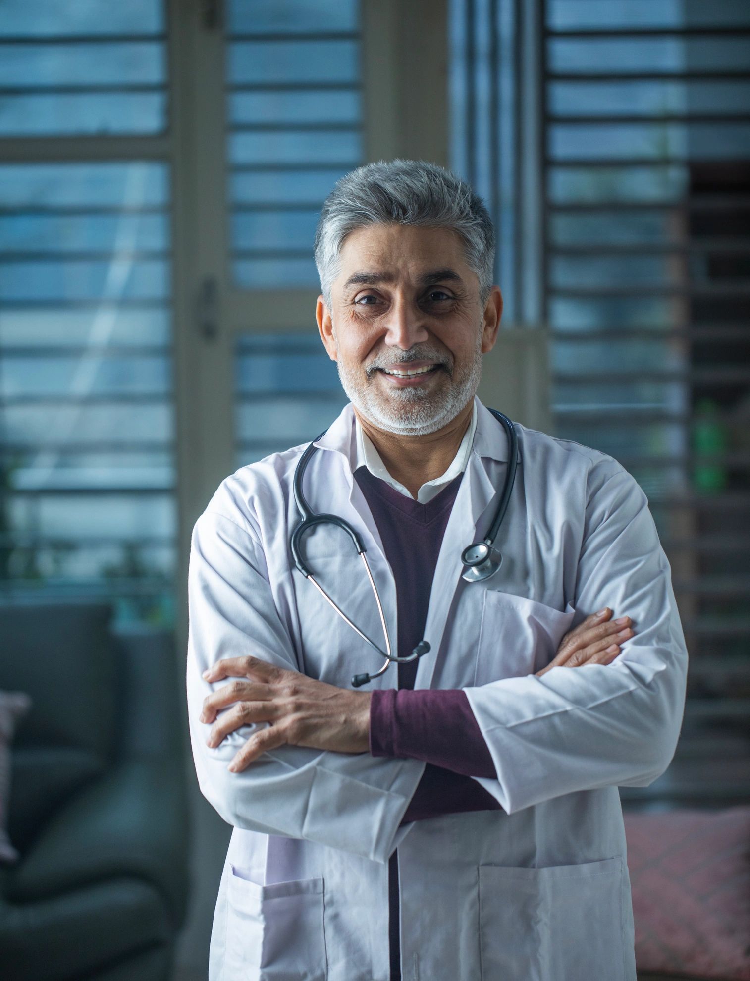 senior Indian male doctor portrait professional